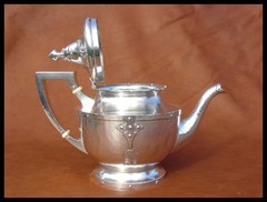 Teapot shown open.